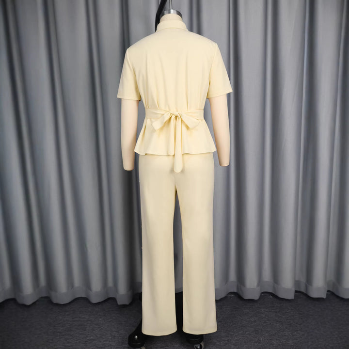 Damen Elegantes Set aus figurbetontem Oberteil mit Cut-Outs und schmal geschnittenen Hosen Echo Archiv