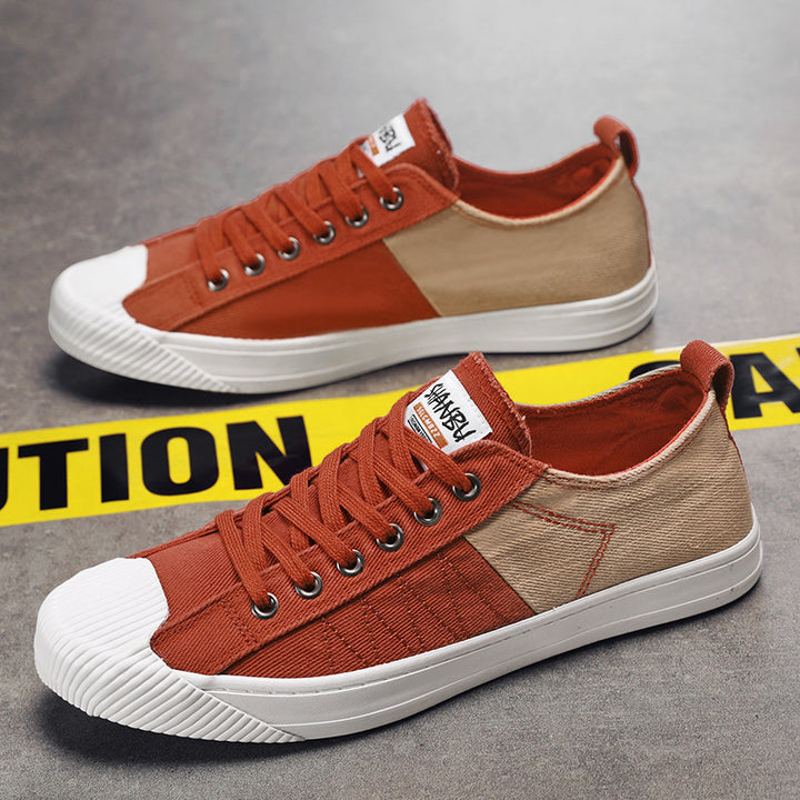 Unisex niedrige Canvas-Sneaker mit verstärkter Gummi-Zehenkappe und kontrastierenden Textilpaneelen – Norré