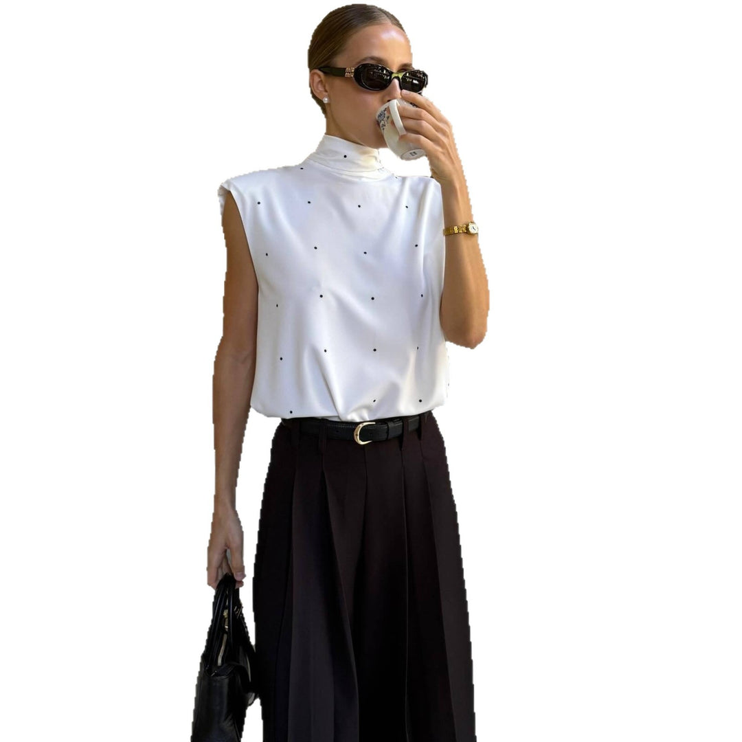 Damen Elegantes Oberteil mit hohem Kragen und feinen Punkten Echo Archiv