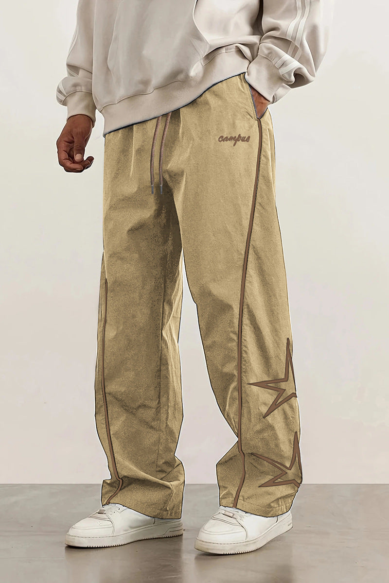 Herren Weite Trackpants mit Kontrastpaspel, Kordelzug und Sternapplikation Echo Archiv