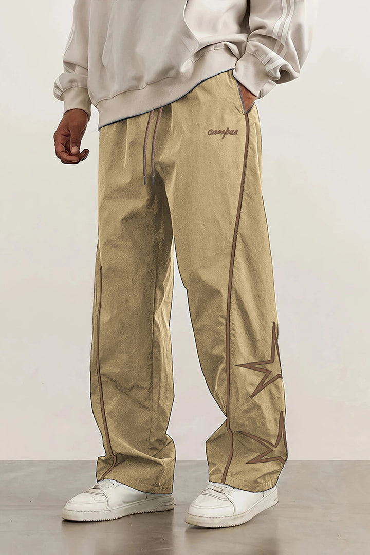 Herren Weite Trackpants mit Kontrastpaspel, Kordelzug und Sternapplikation Echo Archiv