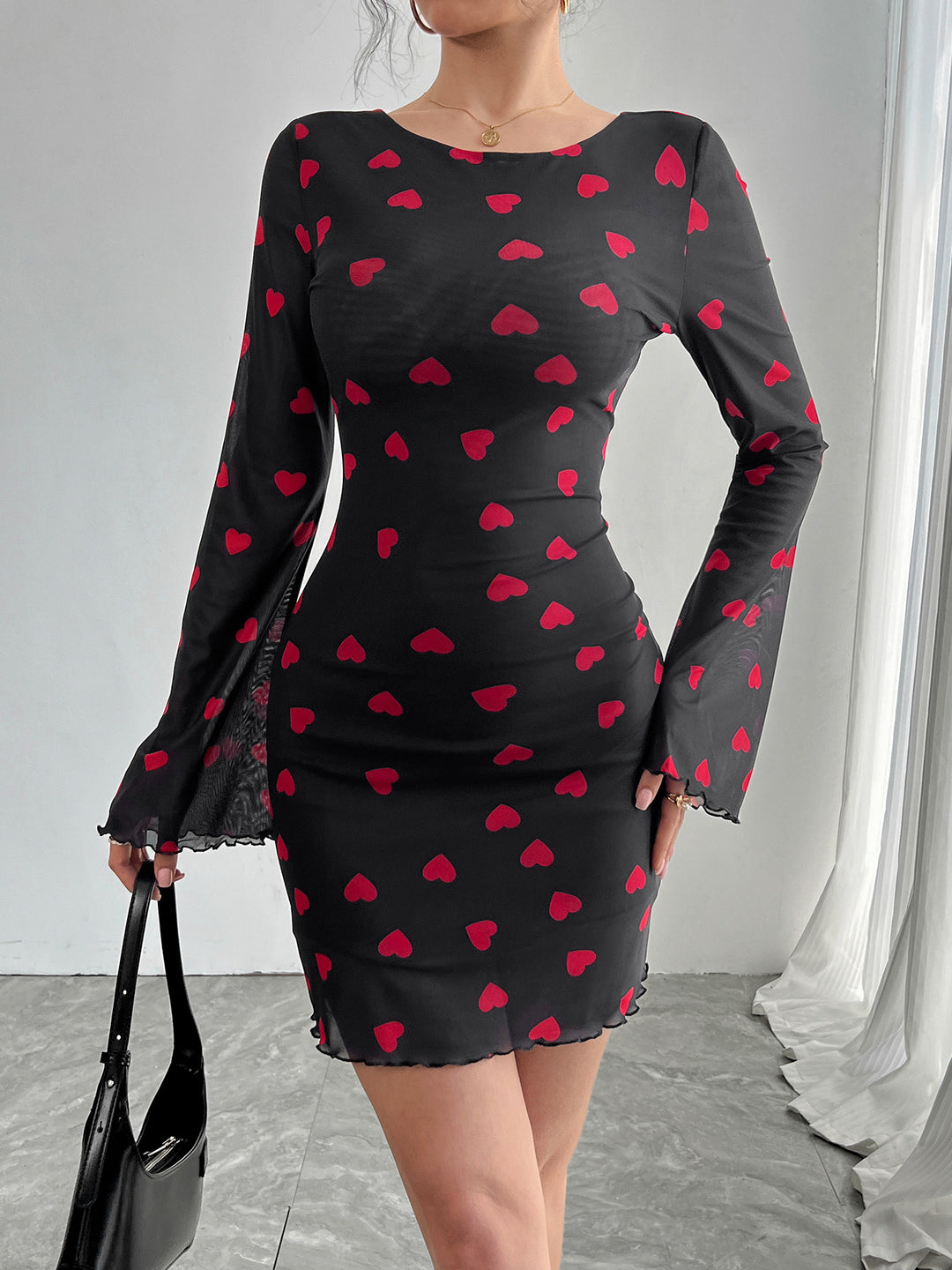 Damen nan figurbetontes Mini-Kleid aus feinem Netzstoff mit Herzmuster und Trompetenärmeln Echo Archiv