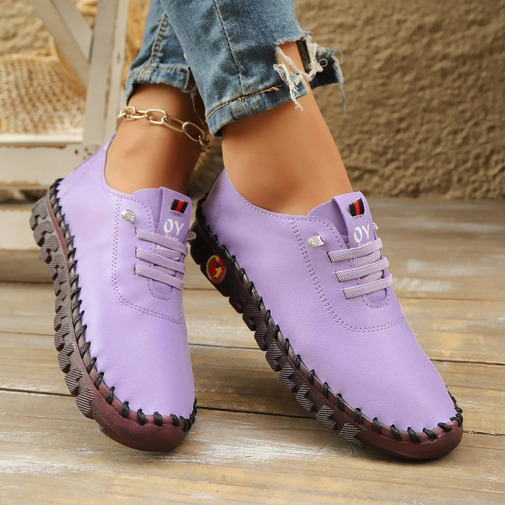 Damen Bequeme Lederoptik-Slipper mit flexibler Profilsohle und Mokassin-Naht – Lioré