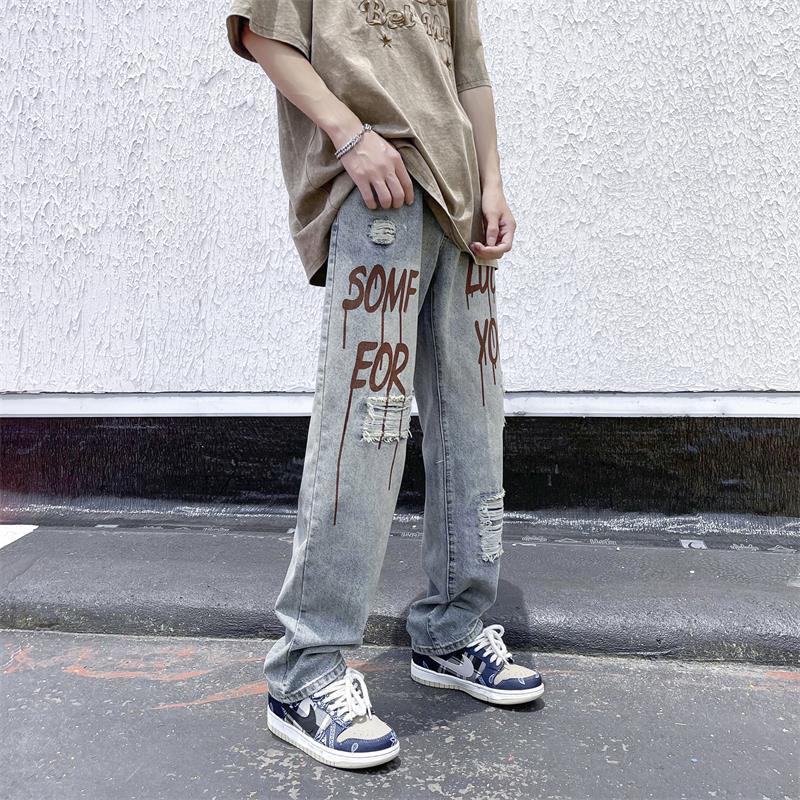 Herren Design Ripped Jeans Echoarchiv