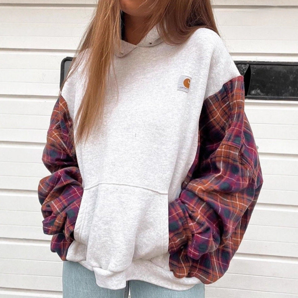 Damen nan oversized Kapuzenpullover mit karierten Flanellärmeln und Kängurutasche Echo Archiv