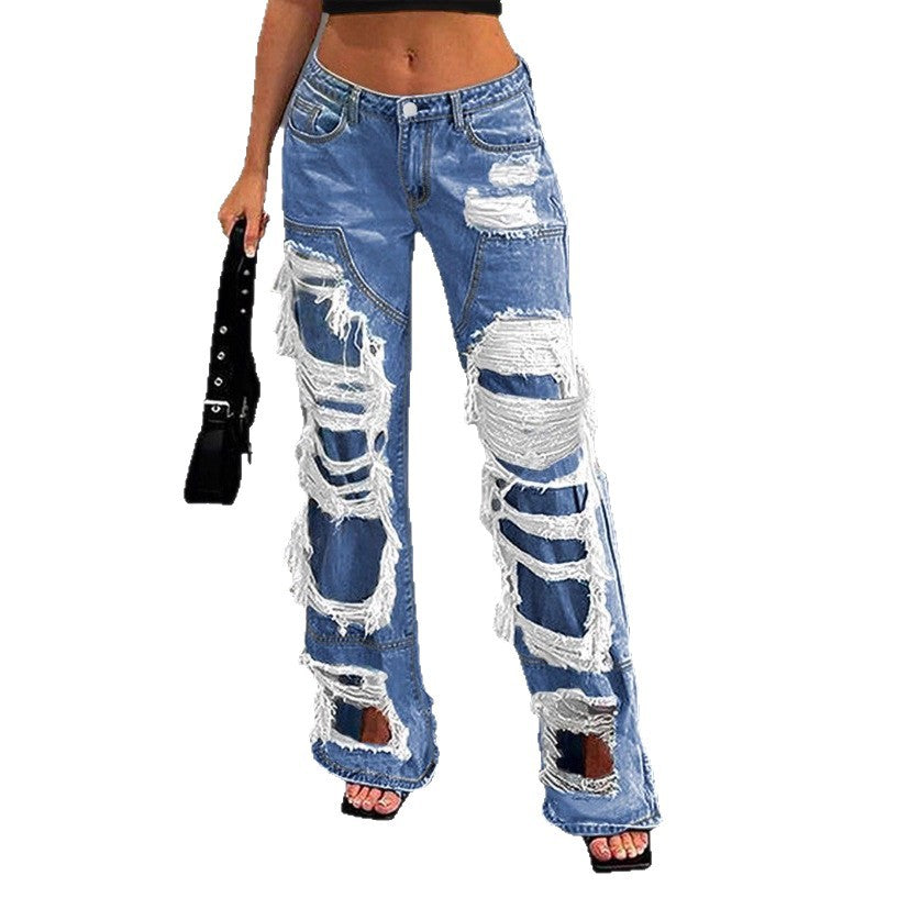 Damen stark zerrissene Flared-Jeans mit weitem Bein und aufgerissenen Einsätzen Echo Archiv