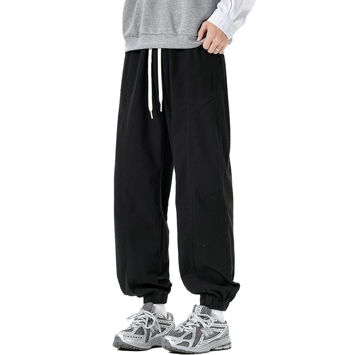 Herren Oversized Utility-Jogginghose aus robustem Baumwollmix mit Kordelbund, seitlichen Cargo‑Taschen & gerippten Bündchen Echoarchiv