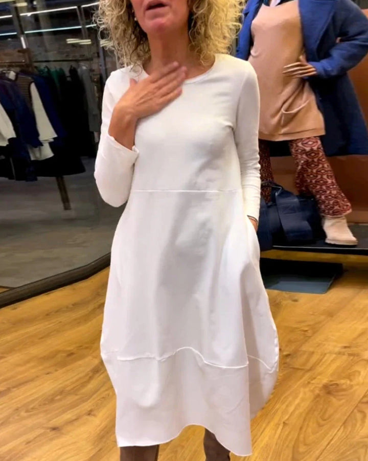 Damen nan asymmetrisches Ballonkleid mit dreiviertelärmeln, seitlichen Eingrifftaschen und fließendem Zipfelsaum Echo Archiv