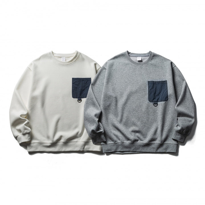 Unisex Oversize-Sweatshirt mit aufgesetzter Brusttasche und D-Ring Echo Archiv