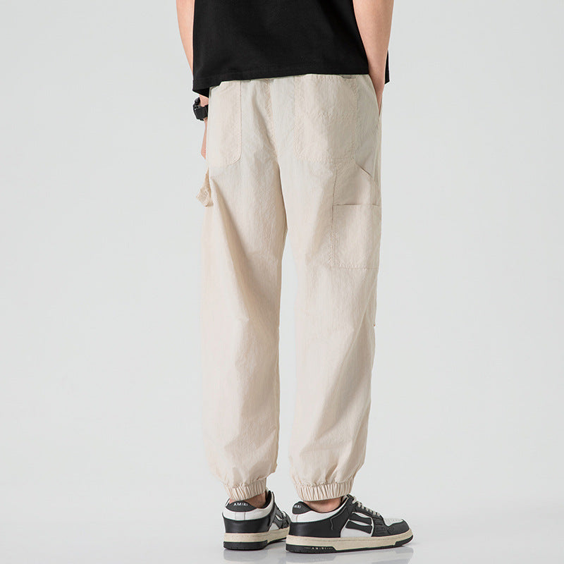 Herren Nylon-Mix Relaxed-Jogger mit elastischem Komfortbund, verdeckten Reißverschlusstaschen und geripptem Knöchelabschluss Echo Archiv
