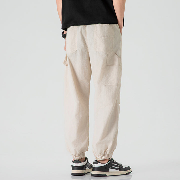 Herren Nylon-Mix Relaxed-Jogger mit elastischem Komfortbund, verdeckten Reißverschlusstaschen und geripptem Knöchelabschluss Echo Archiv