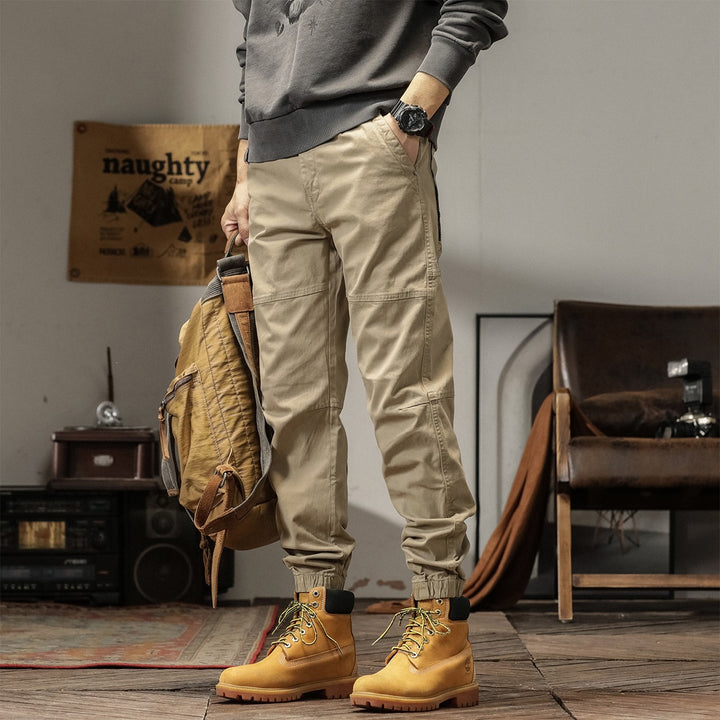 Herren Tapered Cargohose im Joggerstil mit Knie-Teilungsnähten, Tunnelzug & elastischen Bündchen Echoarchiv