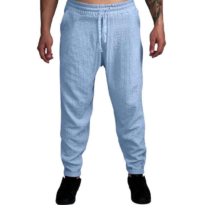 Herren Texturierte tapered Jogginghose mit Elastikbund, Tunnelzug & gerippten Knöchelbündchen – Sorevano