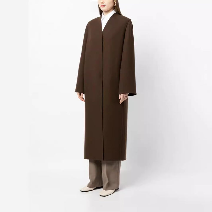 Damen Maxilanger minimalistischer Mantel mit verdeckter Front und kastiger Schulter Echoarchiv