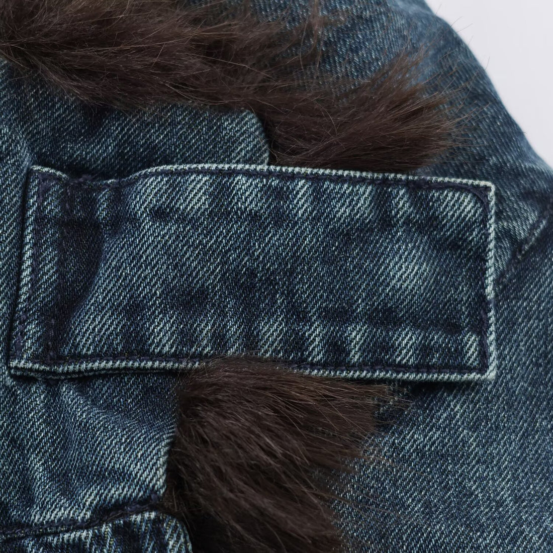 Damen Oversize-Jeansjacke mit voluminösem Kunstpelzkragen und elastischem Saum Echoarchiv