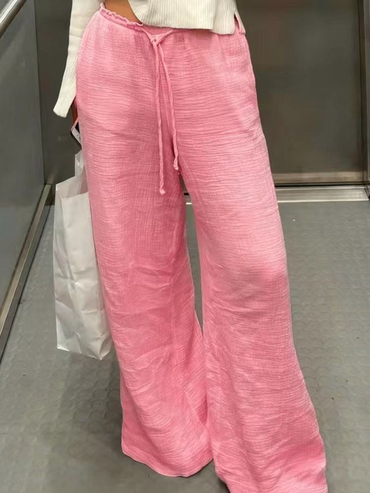 Damen Leinenhose mit lockerer, knöchellanger Passform, seitlichen Eingrifftaschen und Zierknopf-Details – Avélisse