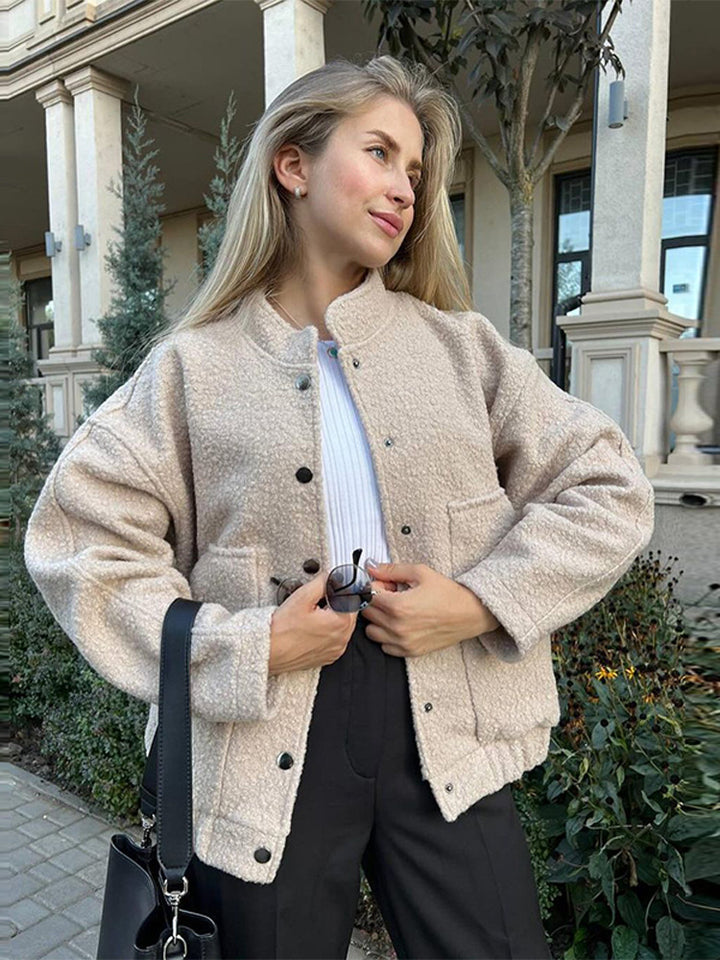 Damen Teddy-Fleece Bomberjacke im Boxy-Cut mit Druckknopfverschluss und aufgesetzten Taschen Echoarchiv