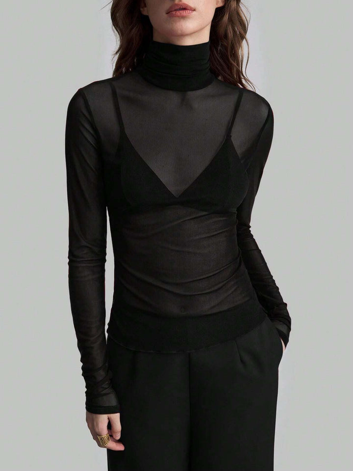 Damen Transparente Turtleneck-Bluse mit figurformendem Schnitt Echoarchiv