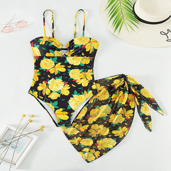 Damen Einteiler Badeanzug mit elegantem Wickelrock und floralem Muster Echo Archiv