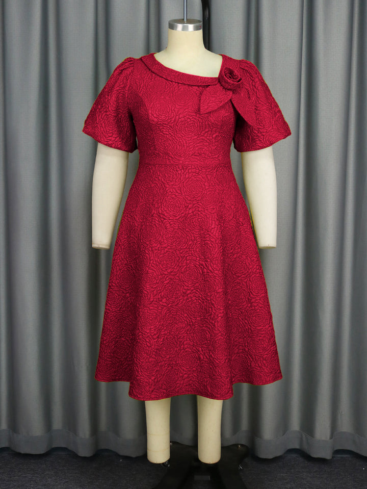Damen Kleid mit elegantem Blumendruck und dekorativer Schleifenverzierung Echo Archiv