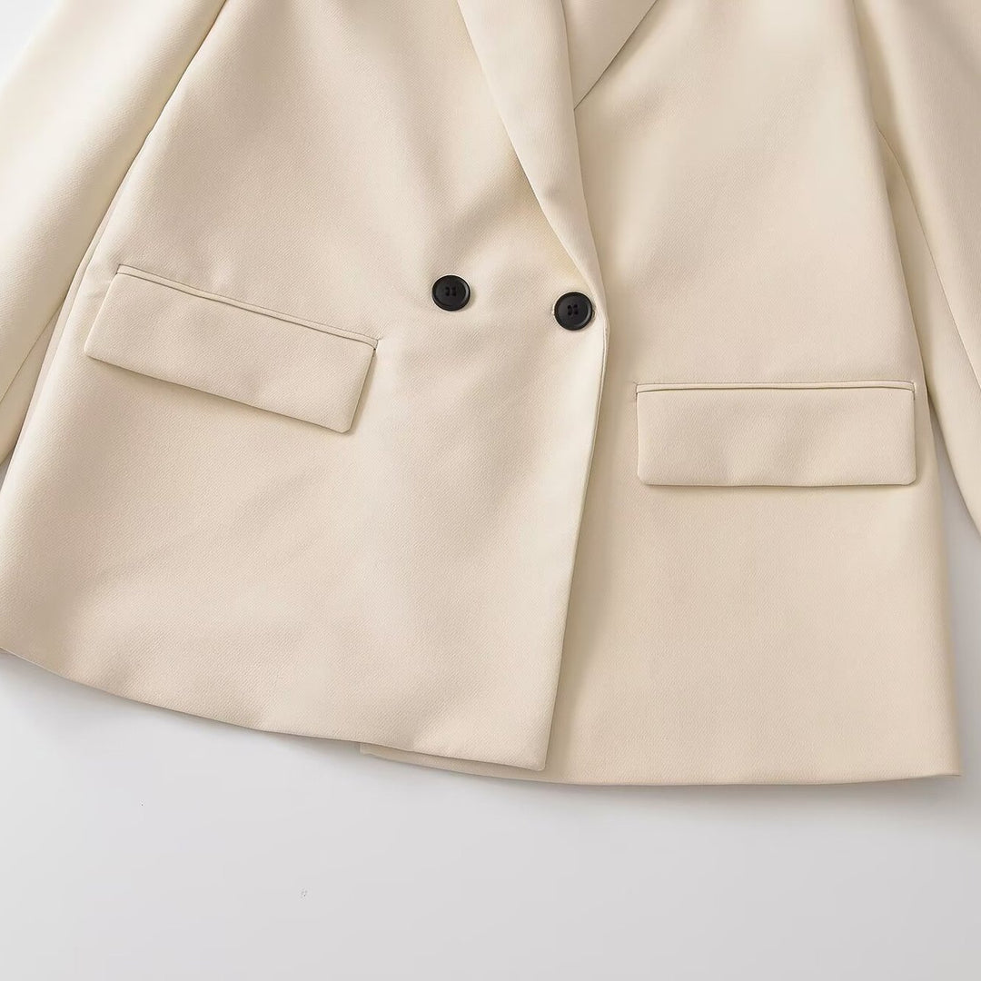 Damen Doppelreihiger Longblazer mit Reverskragen, tailliertem Schnitt und Pattentaschen Echoarchiv