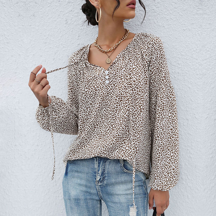 Damen Legere Tunika-Bluse mit feinem Leopardenprint, Knopfleiste und Ballonärmeln Echoarchiv