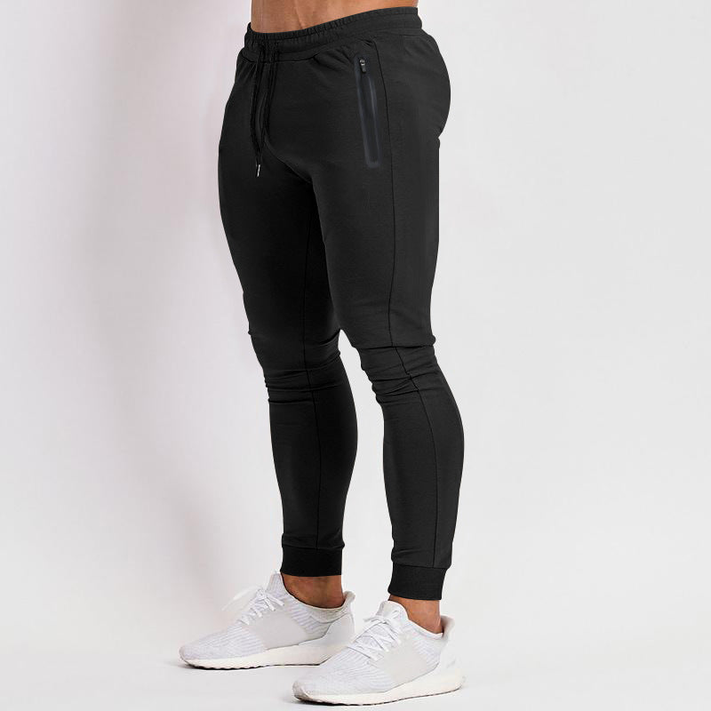 Herren schmal geschnittene Jogginghose mit Reißverschlusstaschen und Kordelzug Echoarchiv