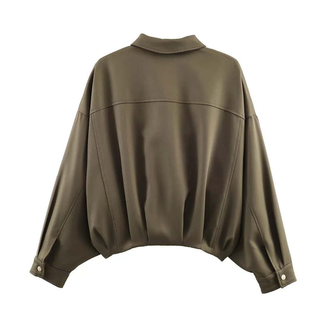 Damen oversized Utility-Jacke mit übergroßen Pattentaschen, überschnittener Schulter und elastischem Bund – Célinea