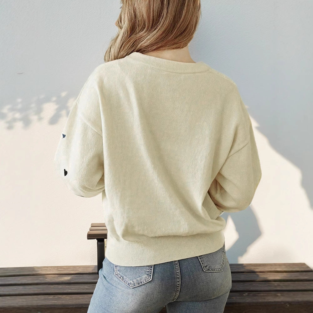 Damen Lockerer Feinstrickpullover mit Herzchen-Allover, Rundhalsausschnitt und elastischem Saum Echoarchiv