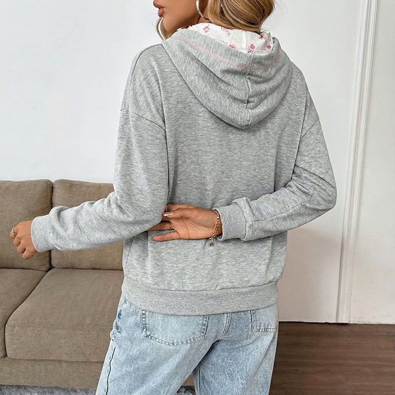 Damen Eleganter Kapuzenpullover mit Spitzenakzenten Echo Archiv