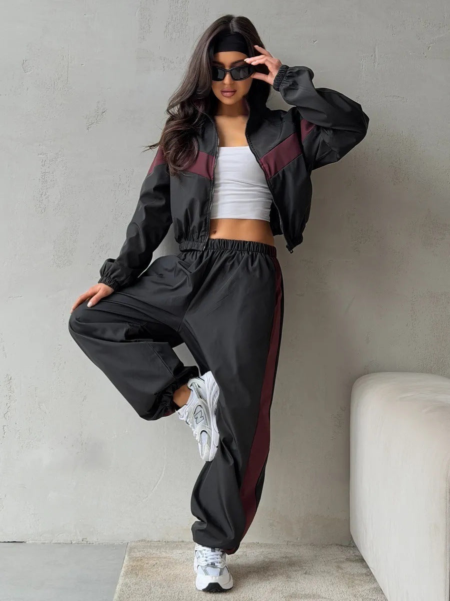 Damen Zweiteiliges Track-Set mit Cropped-Windjacke und weitem Jogger Echoarchiv