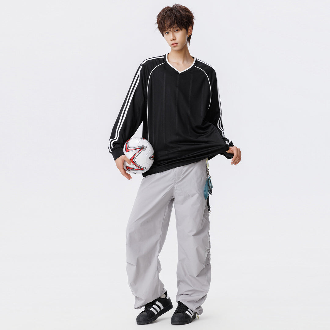 Damen Weites V-Ausschnitt Oversize-Sportshirt mit Raglanärmeln und Kontraststreifen Echo Archiv