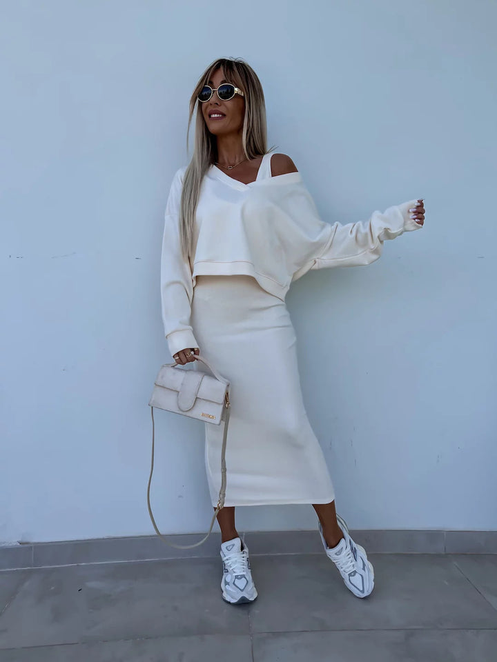 Damen nan zweiteiliges Midirock-Set mit off-shoulder Oversize-Sweatshirt und figurbetontem Bleistiftrock Echo Archiv