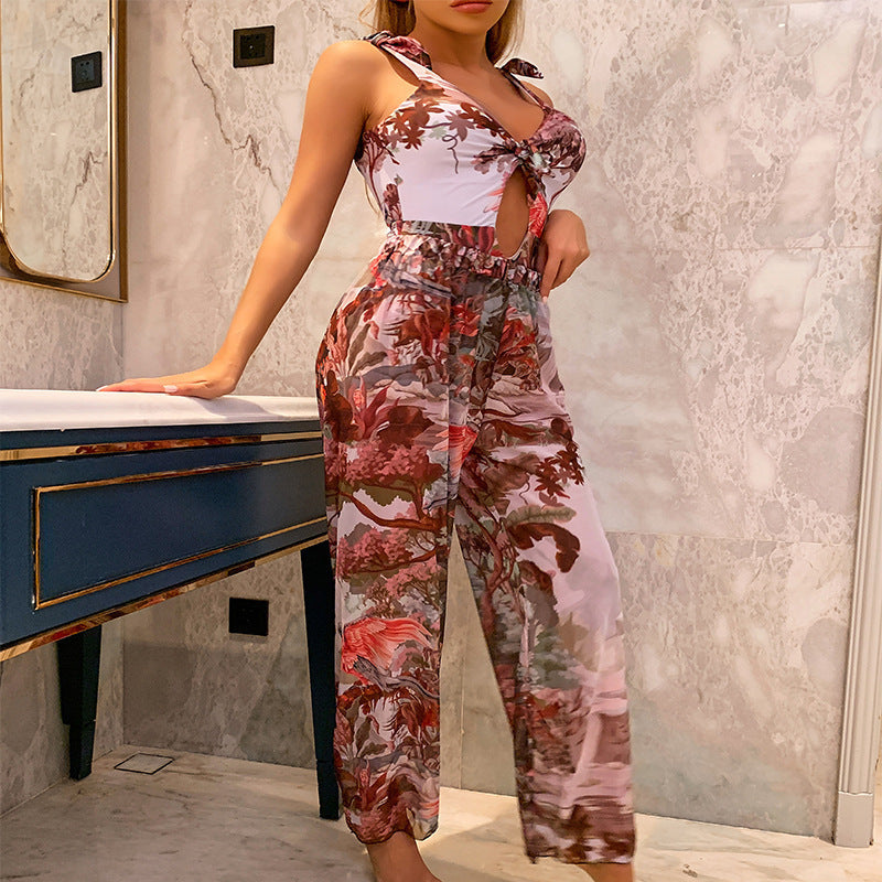 Damen Jumpsuit mit floralem Muster und verspieltem Knotendesign Echo Archiv