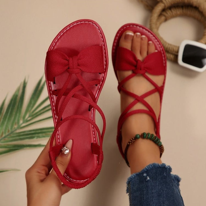 Damen Zarte Römersandalen mit Schleifen-Detail und verstellbaren Schnürriemen Echo Archiv