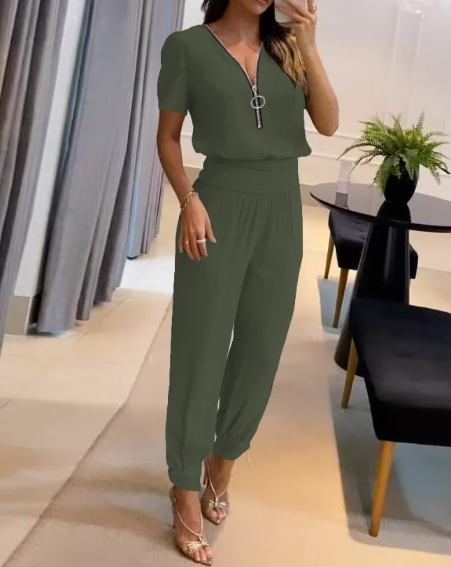 Damen Jumpsuit mit V-Ausschnitt und Gummizug Echoarchiv