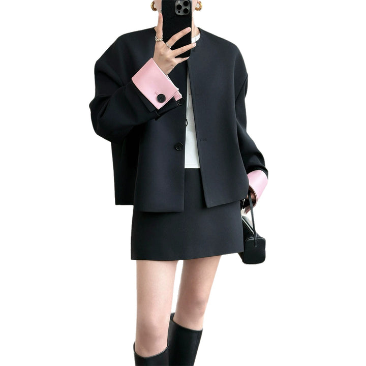 Damen Modische und elegante Jacke mit kontrastierenden Ärmeln Echoarchiv