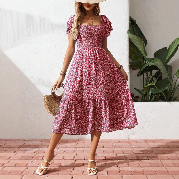 Damen Off-Shoulder Maxikleid mit floralen Mustern und elastischem Oberteil Echo Archiv