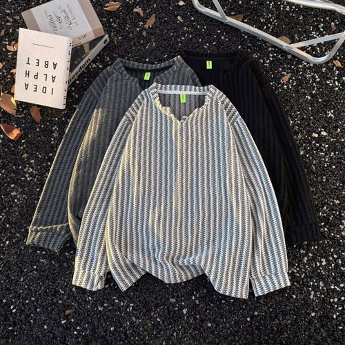 Damen Feinstrick-Pullover mit feiner Waffelstruktur, V-Notch-Ausschnitt und legerer Oversize-Passform Echoarchiv