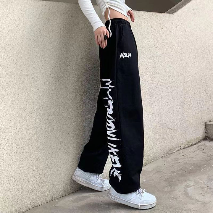 Damen locker geschnittene Wide‑Leg Jogginghose mit hohem Bund und markantem Seitenschriftzug – Avélisse
