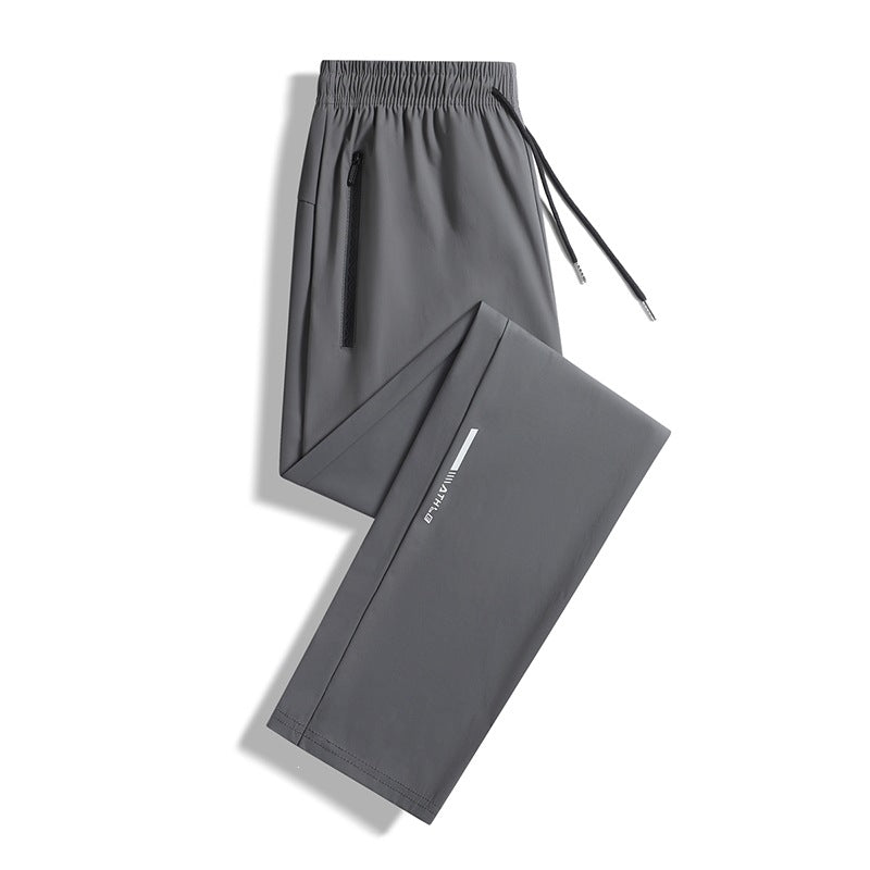 Herren Sportliche Jogginghose mit elastischem Bund und praktischen Reißverschlusstaschen Echo Archiv