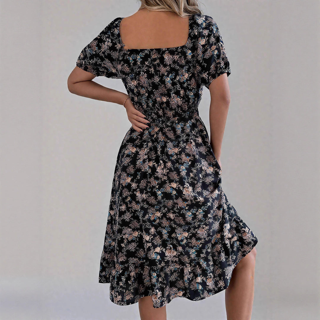 Damen sommerliches Blumenkleid mit Puffärmeln und Rüschensaum Echo Archiv