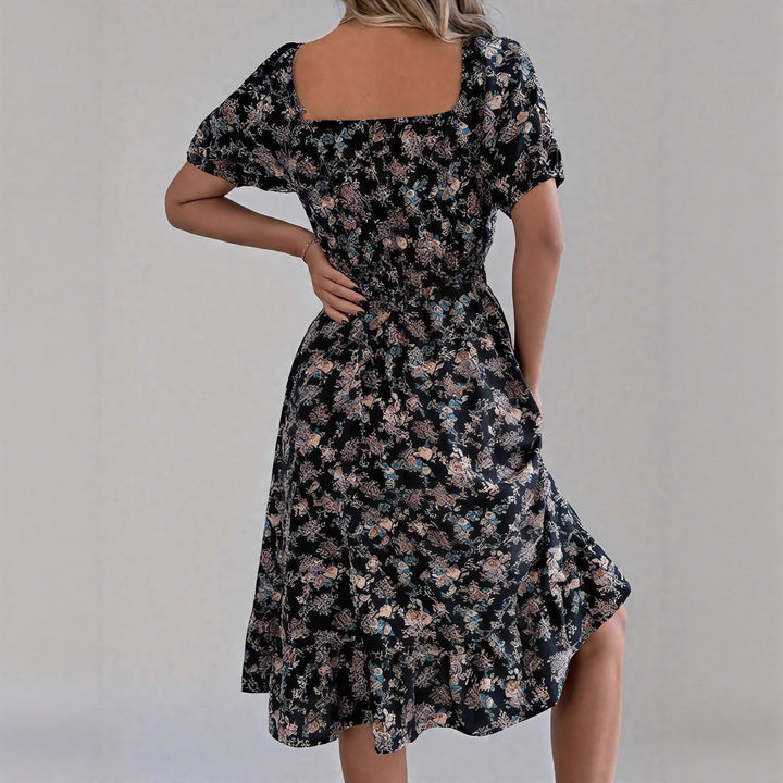 Damen sommerliches Blumenkleid mit Puffärmeln und Rüschensaum Echo Archiv