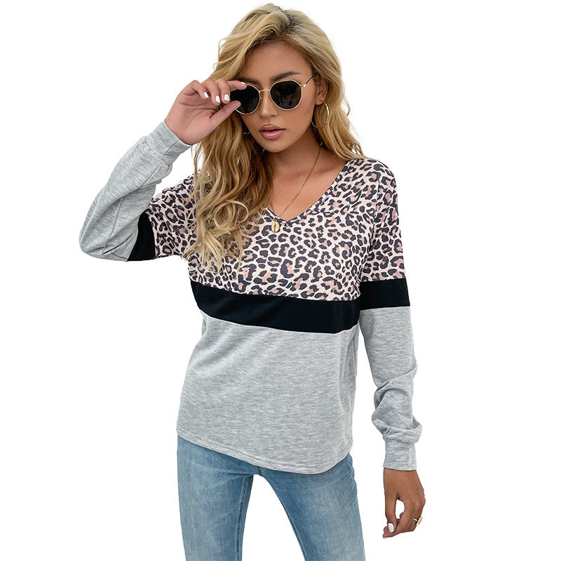 Damen Langarmshirt mit V-Ausschnitt und Leopardenmuster im Colorblock-Design Echoarchiv