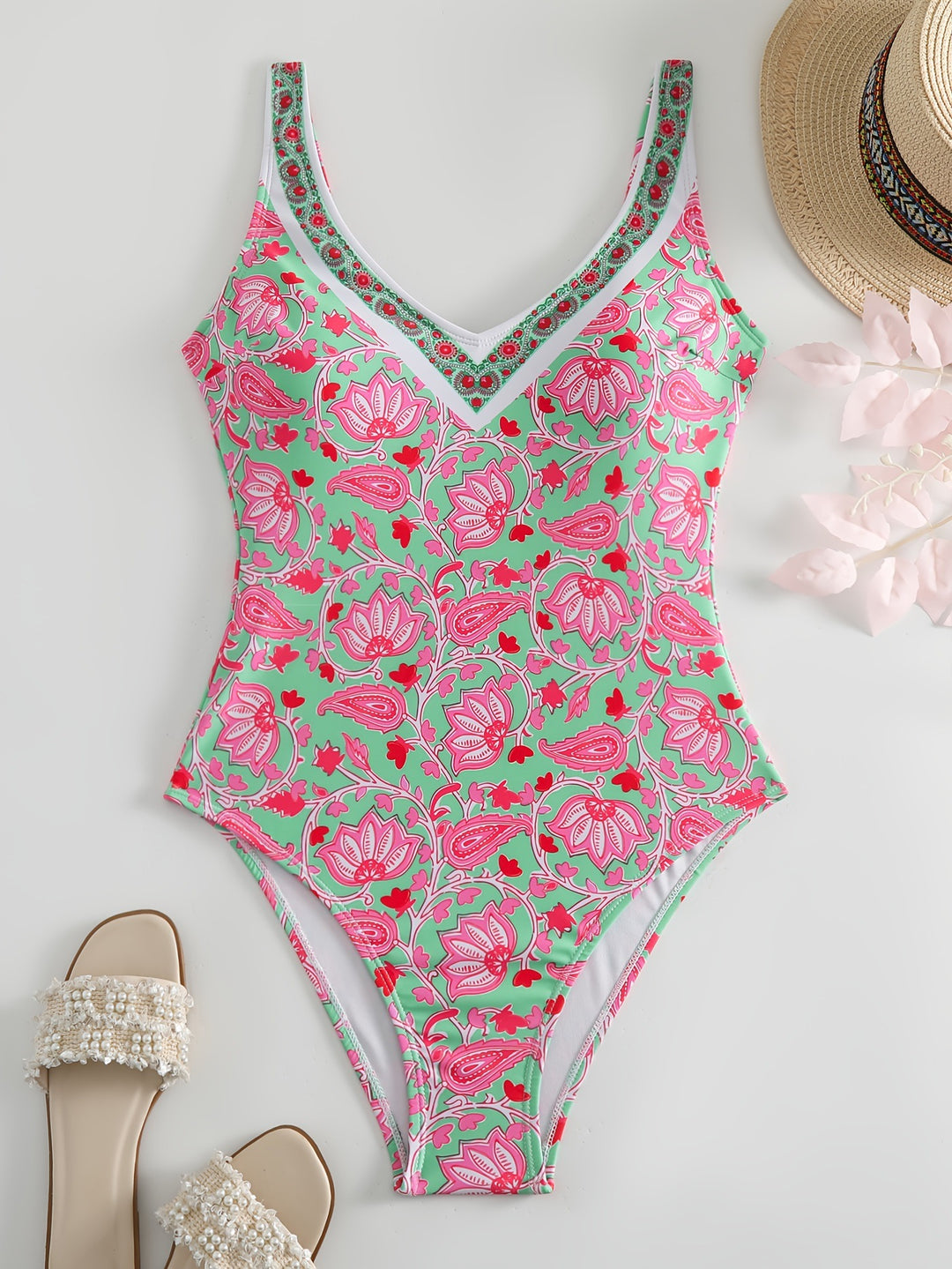 Damen Einteiliger Badeanzug mit floralem Design und modischen Trägern Echo Archiv