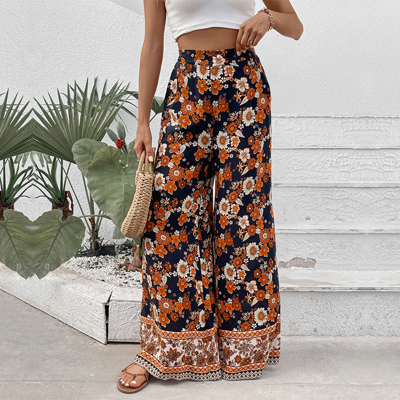 Damen Hochtaillierte weite Palazzohose mit floralem Alloverprint und Eingrifftaschen Echoarchiv
