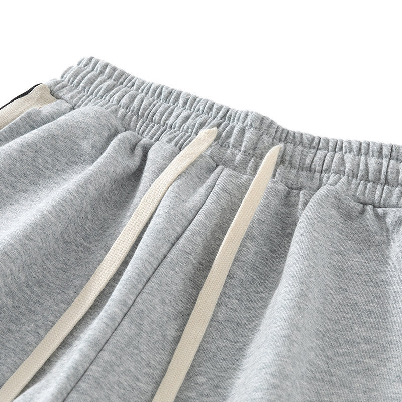 Herren Locker geschnittene Jogginghose mit elastischem Bund, Kordelzug und kontrastfarbenen Seitenstreifen Echo Archiv