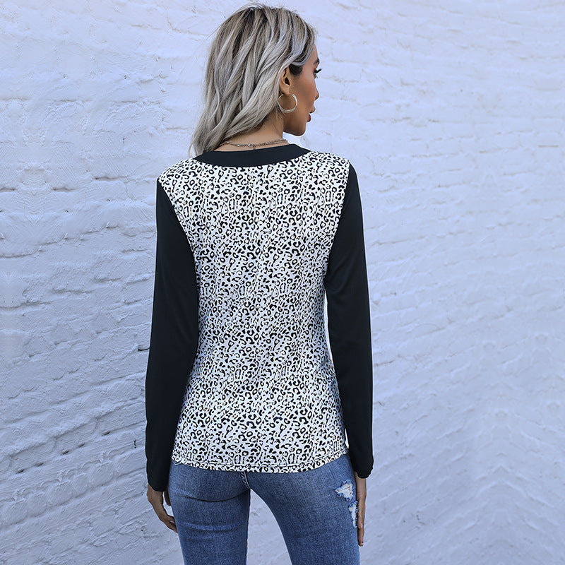 Damen Langarmshirt im Animal-Print mit kontrastierenden Ärmeln, Knopfleiste und Brusttaschen Echoarchiv