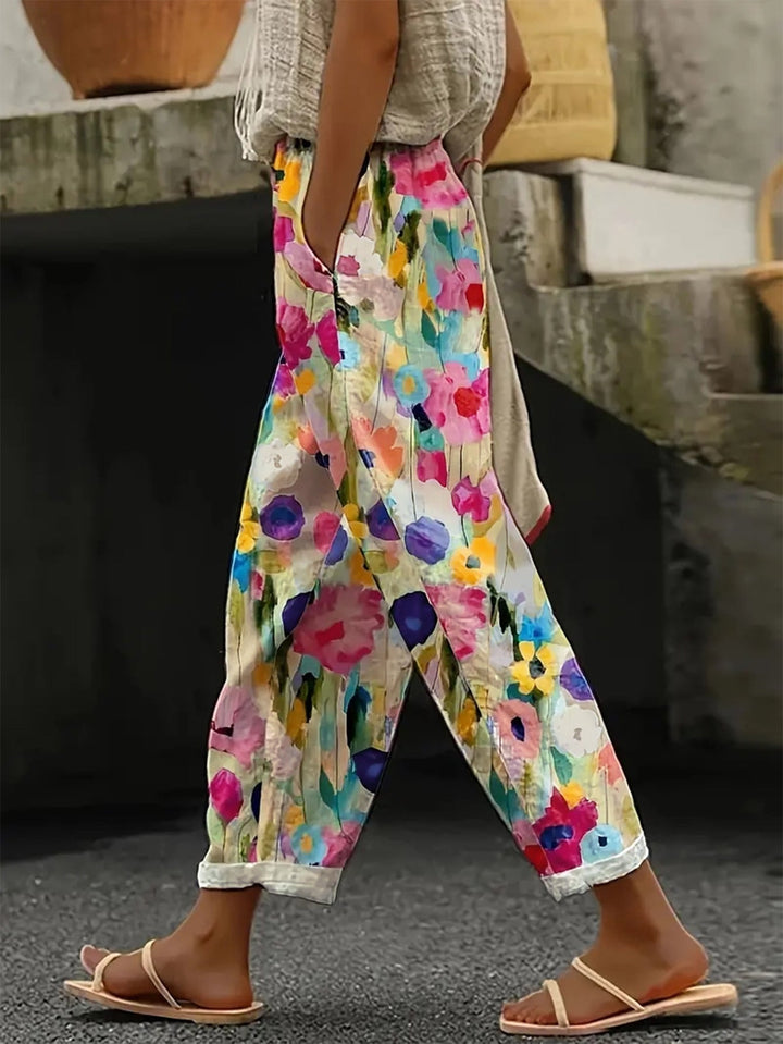 Damen Weite Sommerhose mit floralem Design und praktischen Taschen Echoarchiv