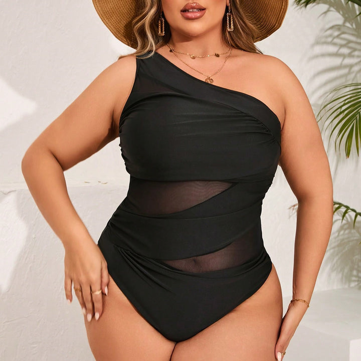 Damen Einteiler Badeanzug mit asymmetrischem Schnitt und transparenten Rüschendetails Echo Archiv